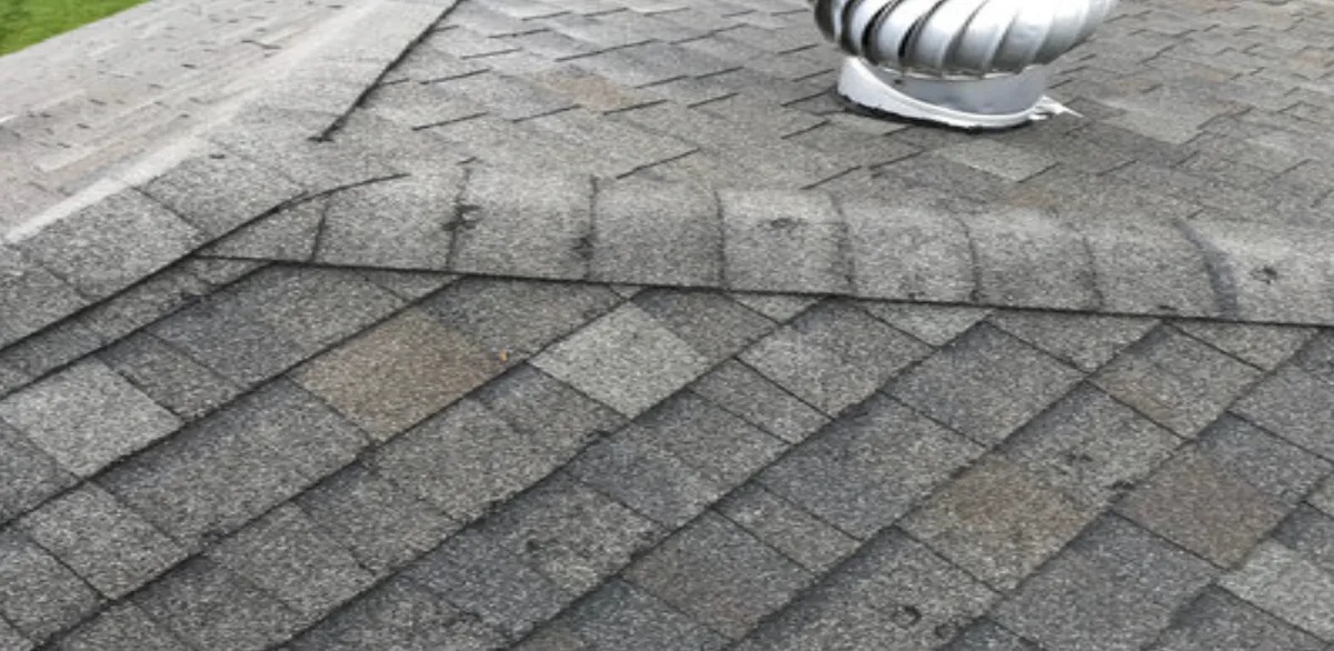 Shingle roof ridge with a turbine vent